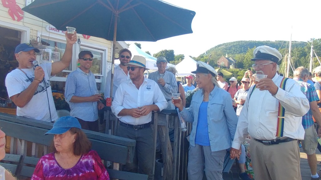 Captains gather at Camden Windjammer Association by the Harbormaster's house. 