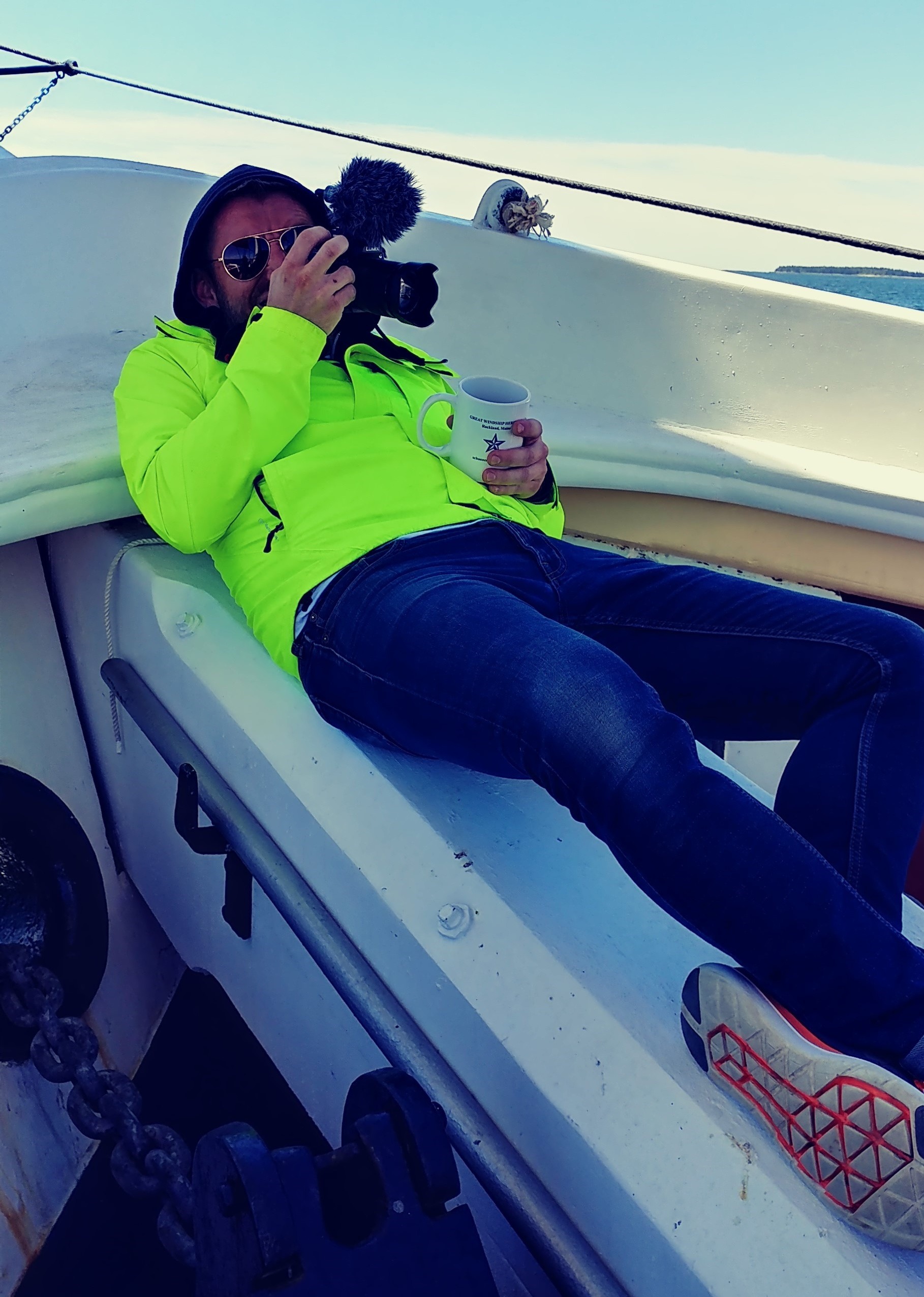 Photographer taking photos on Schooner Heritage